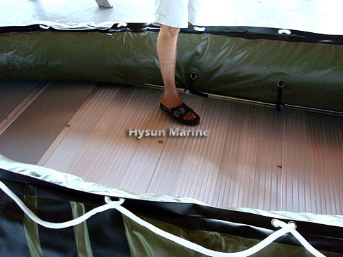 Make sure that floor will flatten by spreading inside the boat